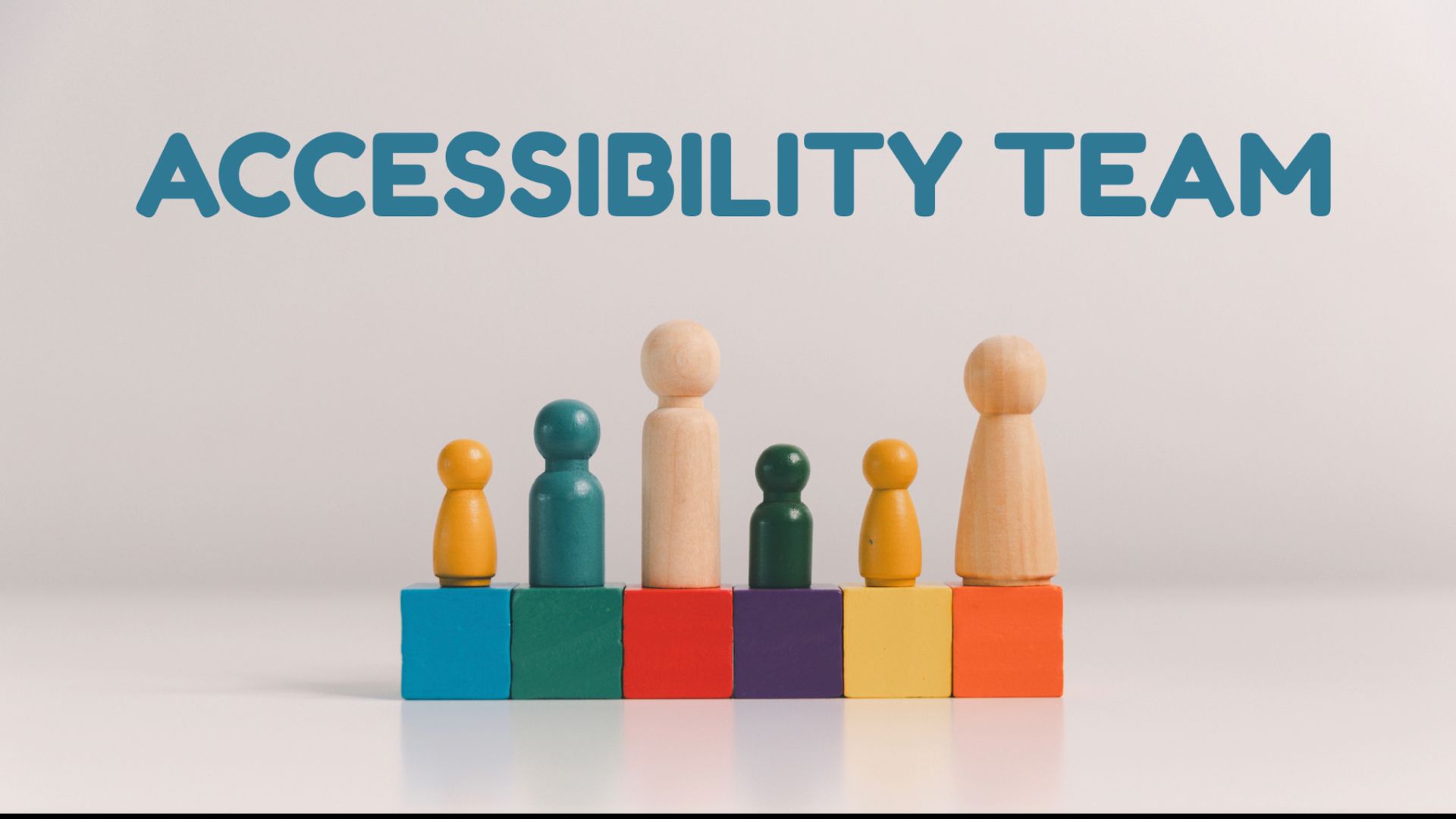 Accessibility Team, featuring an image of different colored wooden people stood on wooden blocks.