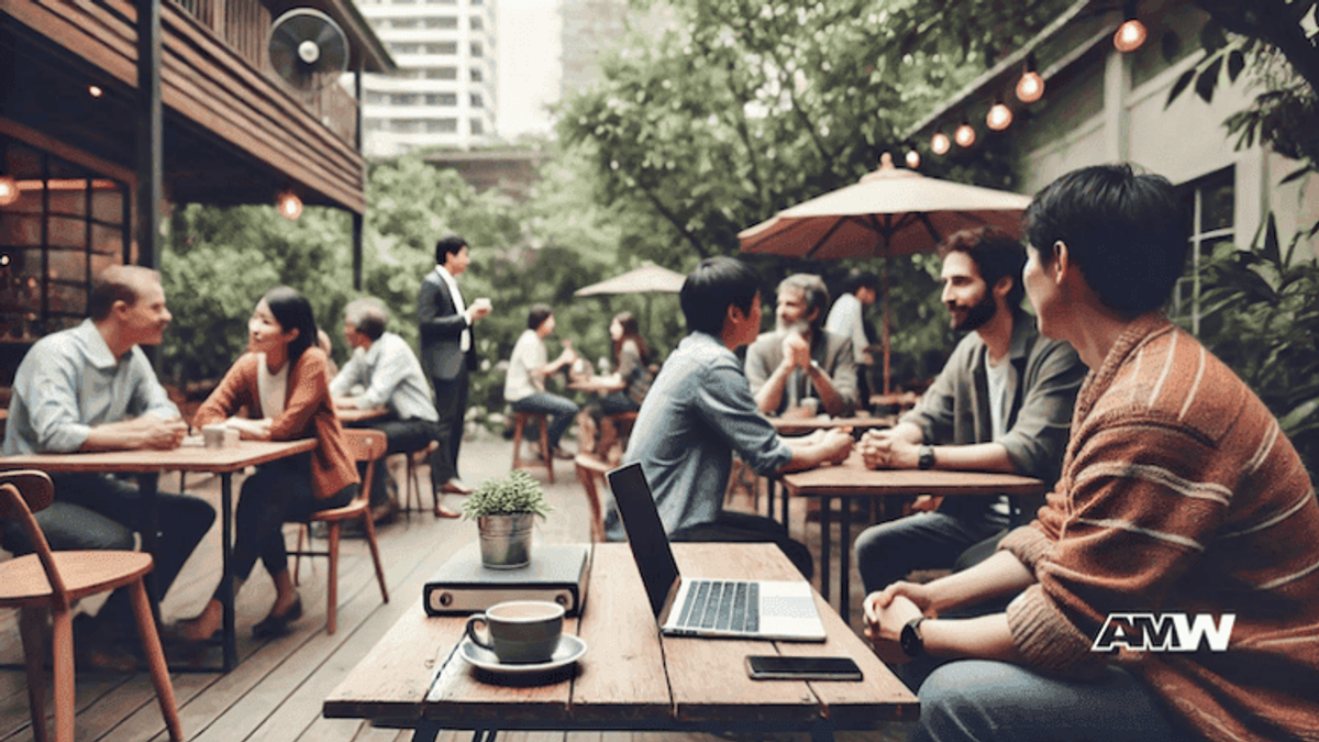 Outdoor cafe with people working and socializing