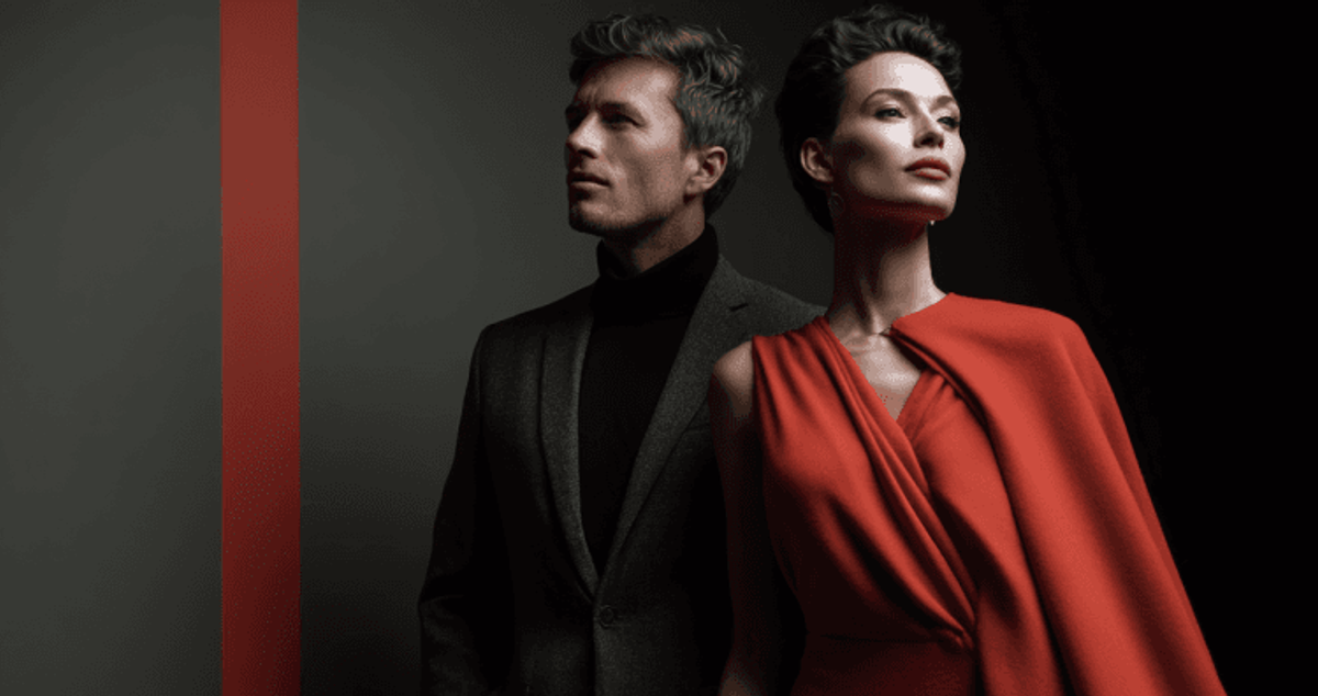 Stylish individuals in bold red and gray outfits.