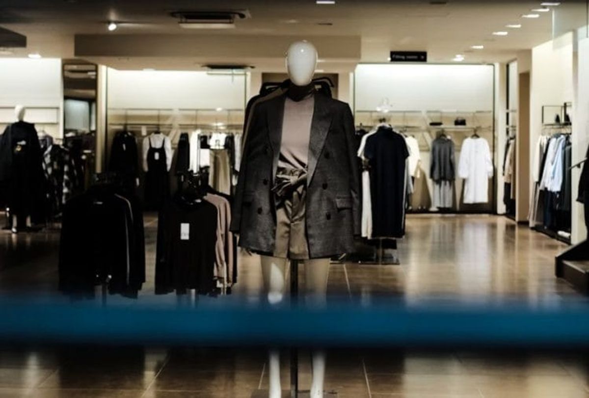 Fashionable mannequin in stylish store display.