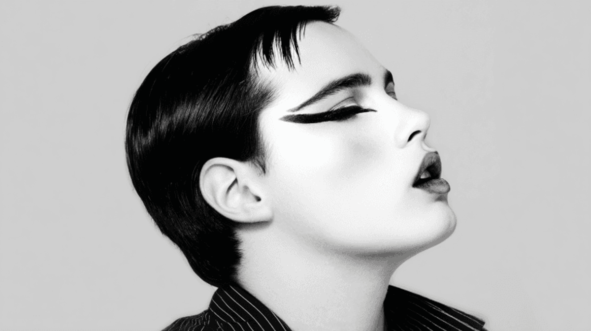 Profile portrait with bold cat-eye makeup