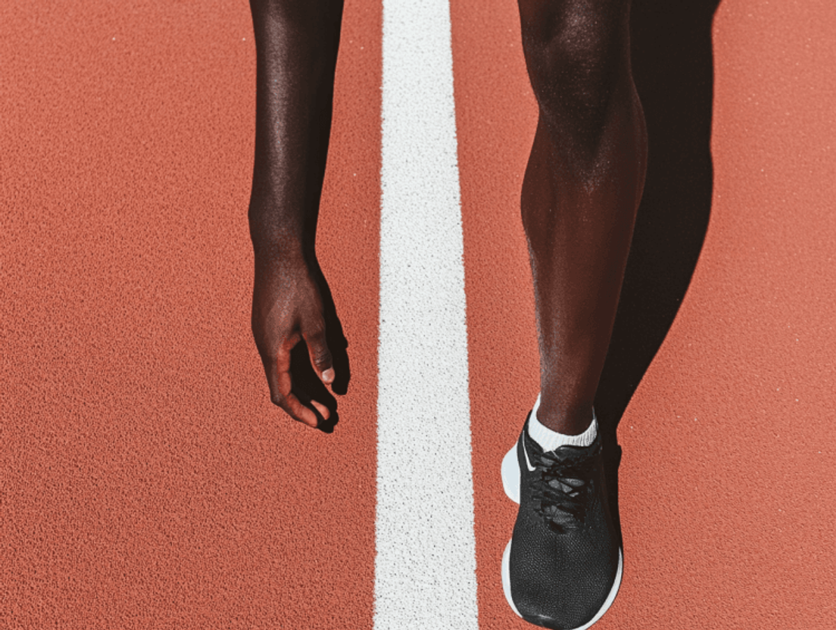 Athlete at start line on track