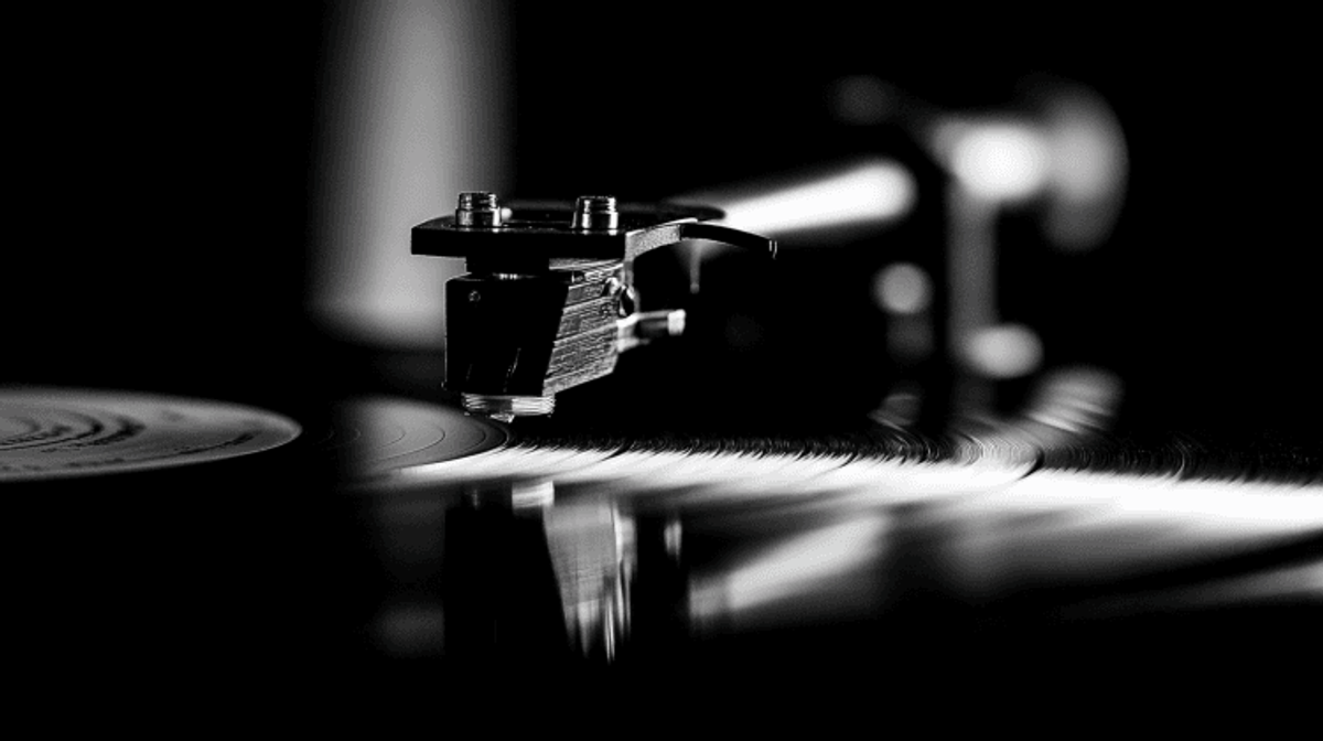 Close-up of turntable needle on vinyl record.