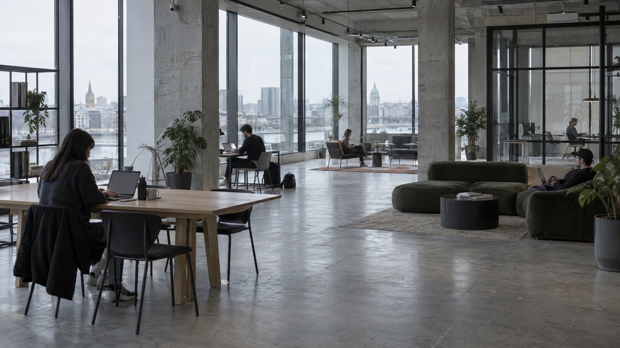Coworking floor with a few people working far apart