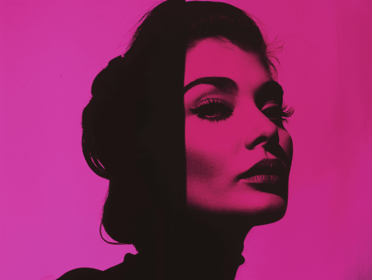 Silhouetted woman in pink monochrome