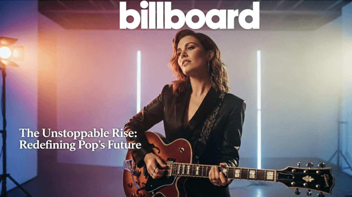 Musician with guitar on Billboard cover, pop music rise.