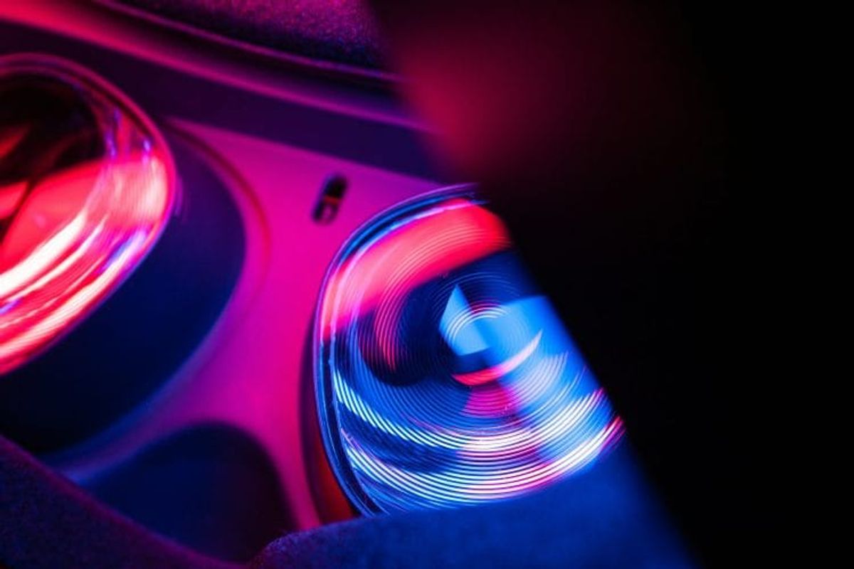 Colorful swirling lights in dark background