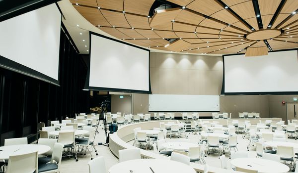 Professional event setup with elegant lighting and decor - understanding event planner vs coordinator roles