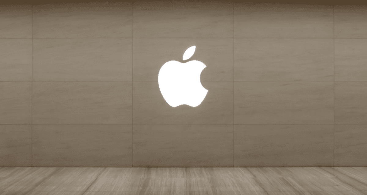Apple logo on a wooden wall background.