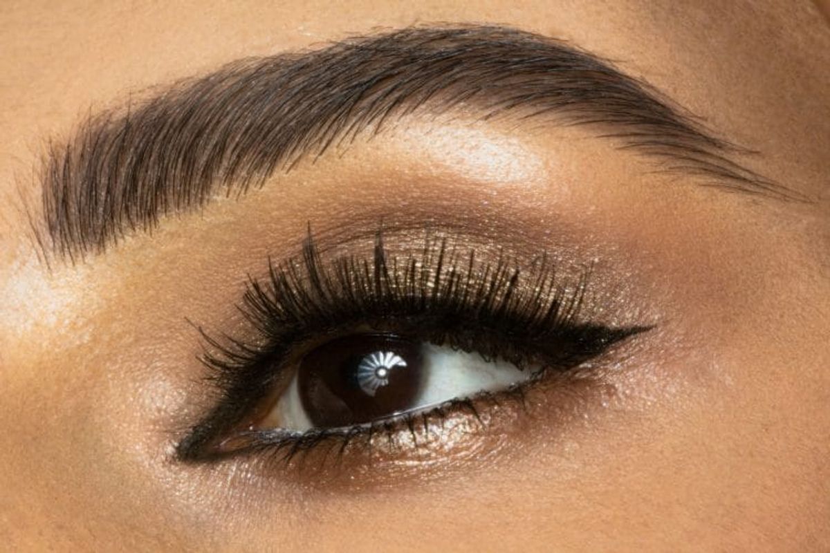 Close-up of eye with makeup and eyebrow