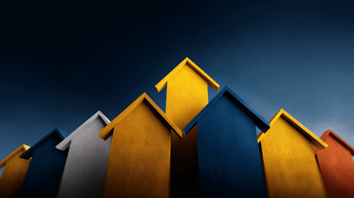 Colorful upward-pointing arrows against dark sky background.