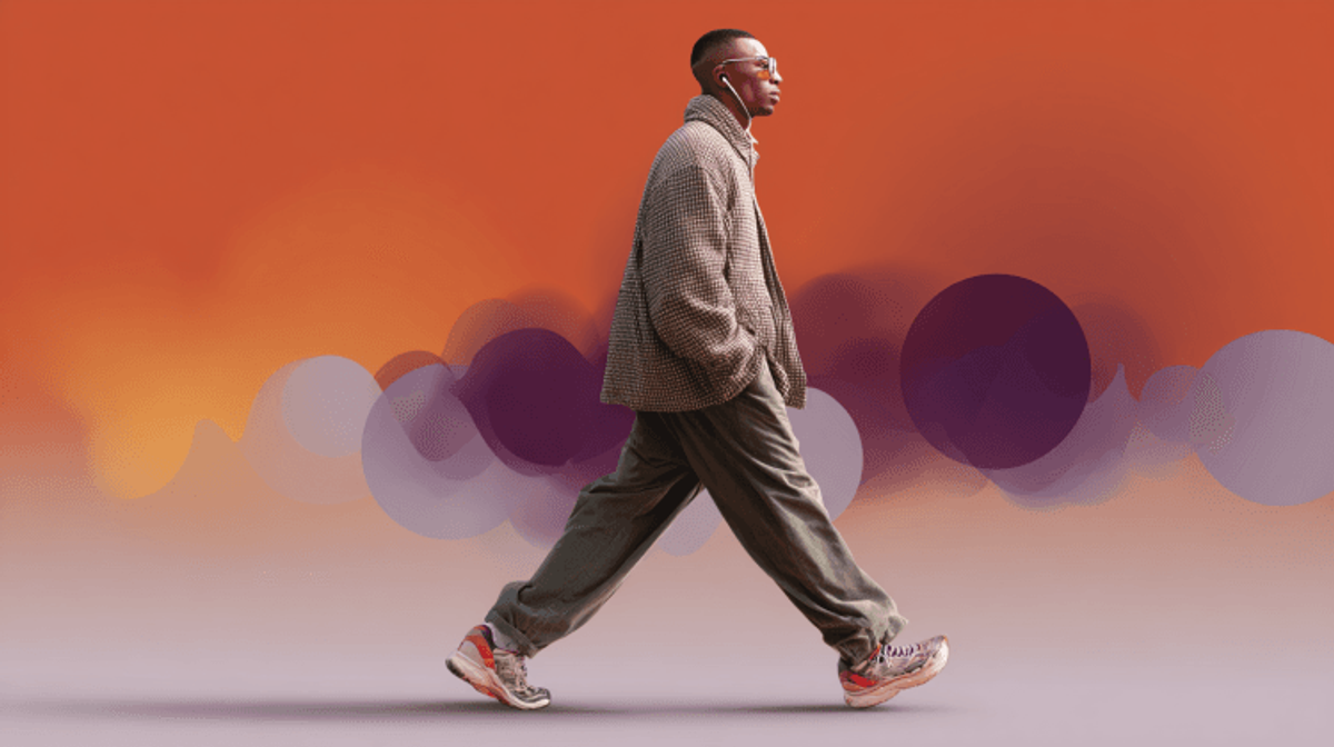 Person walking with headphones and colorful background