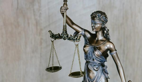 Professional law office interior with legal library and meeting space