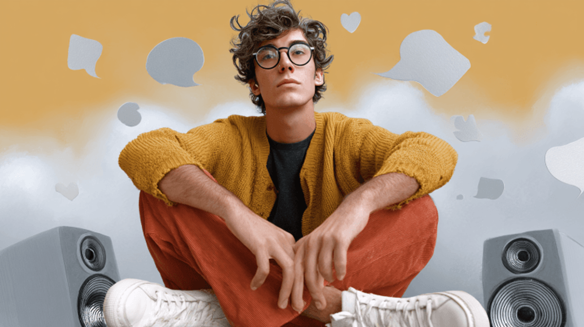 Person sitting with speakers and speech bubbles.