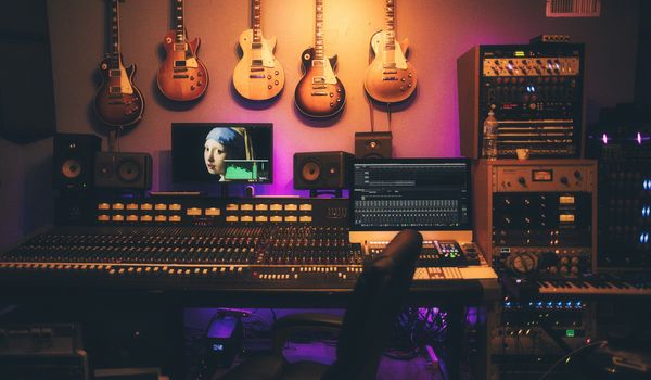 Music producer working at home studio - Best SoundCloud promotion services