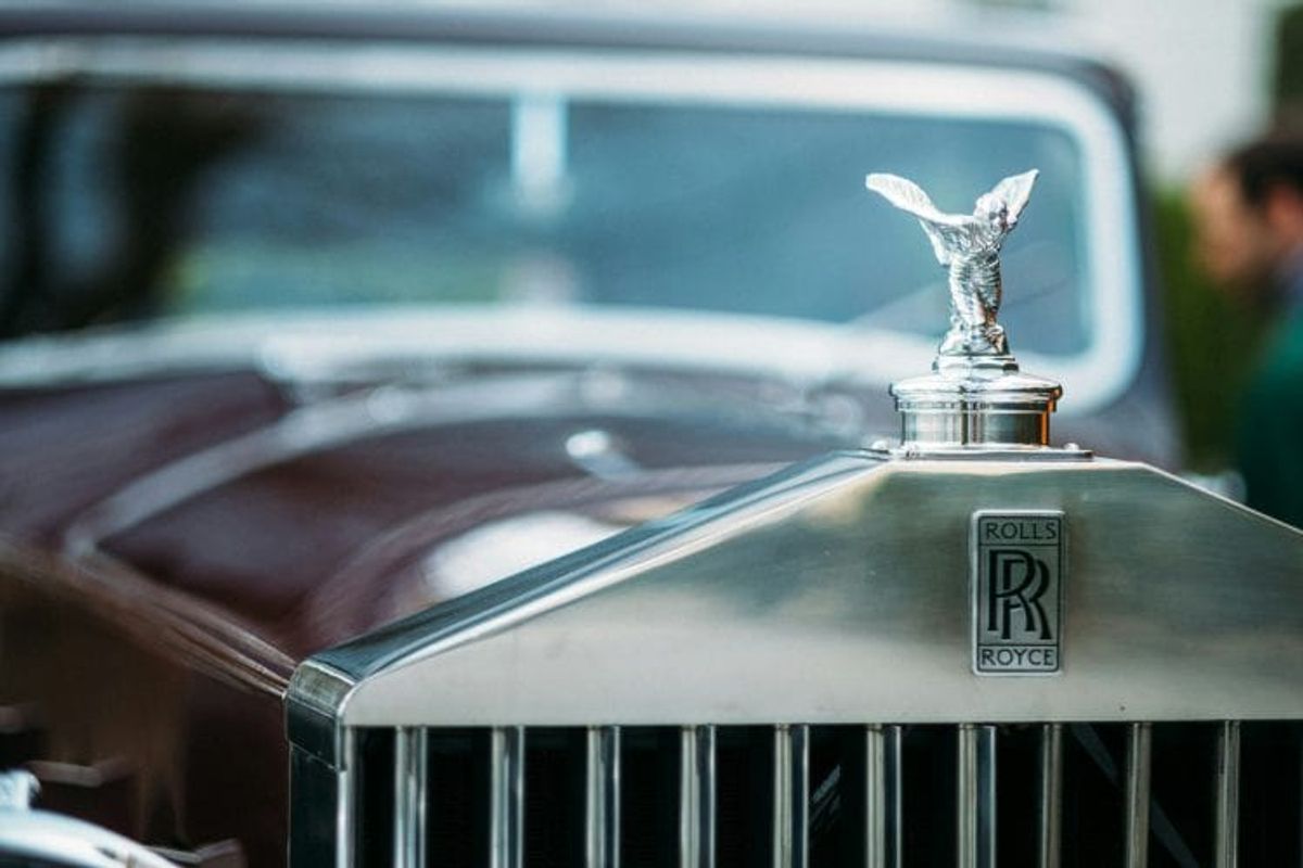 Close-up of Rolls Royce hood ornament.