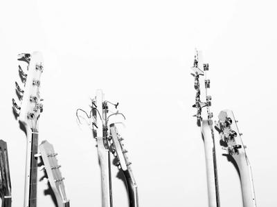 Music industry professional working on what you need to know about using spotify playlists for song promotion