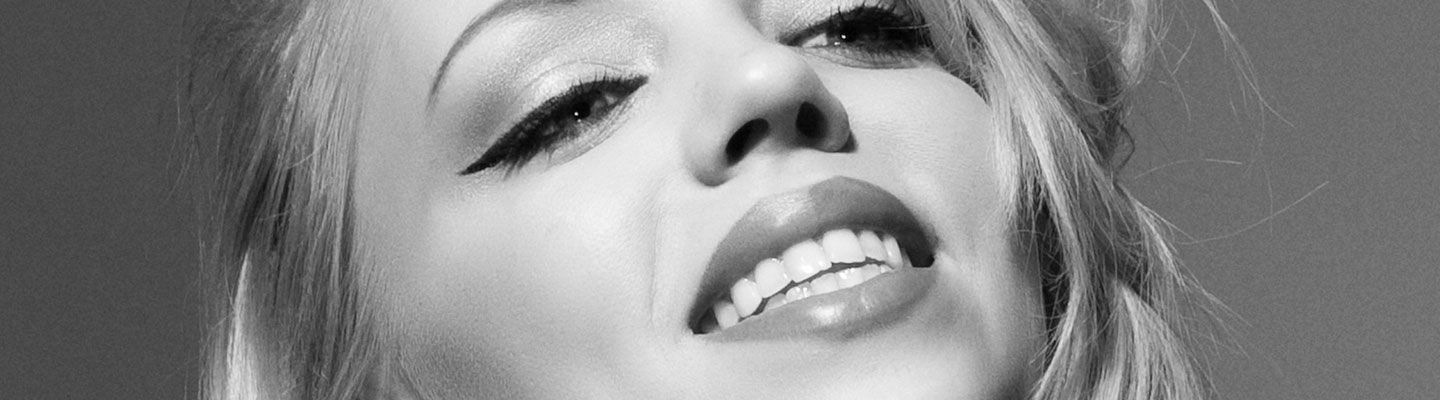 Woman welcoming visitors to AMW Marketing Agency