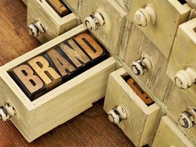 Marketing team discussing biggest branding mistakes we commit