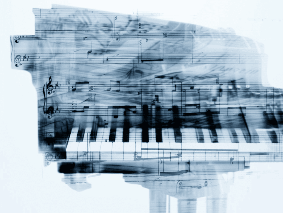 Piano keys and sheet music overlay image.