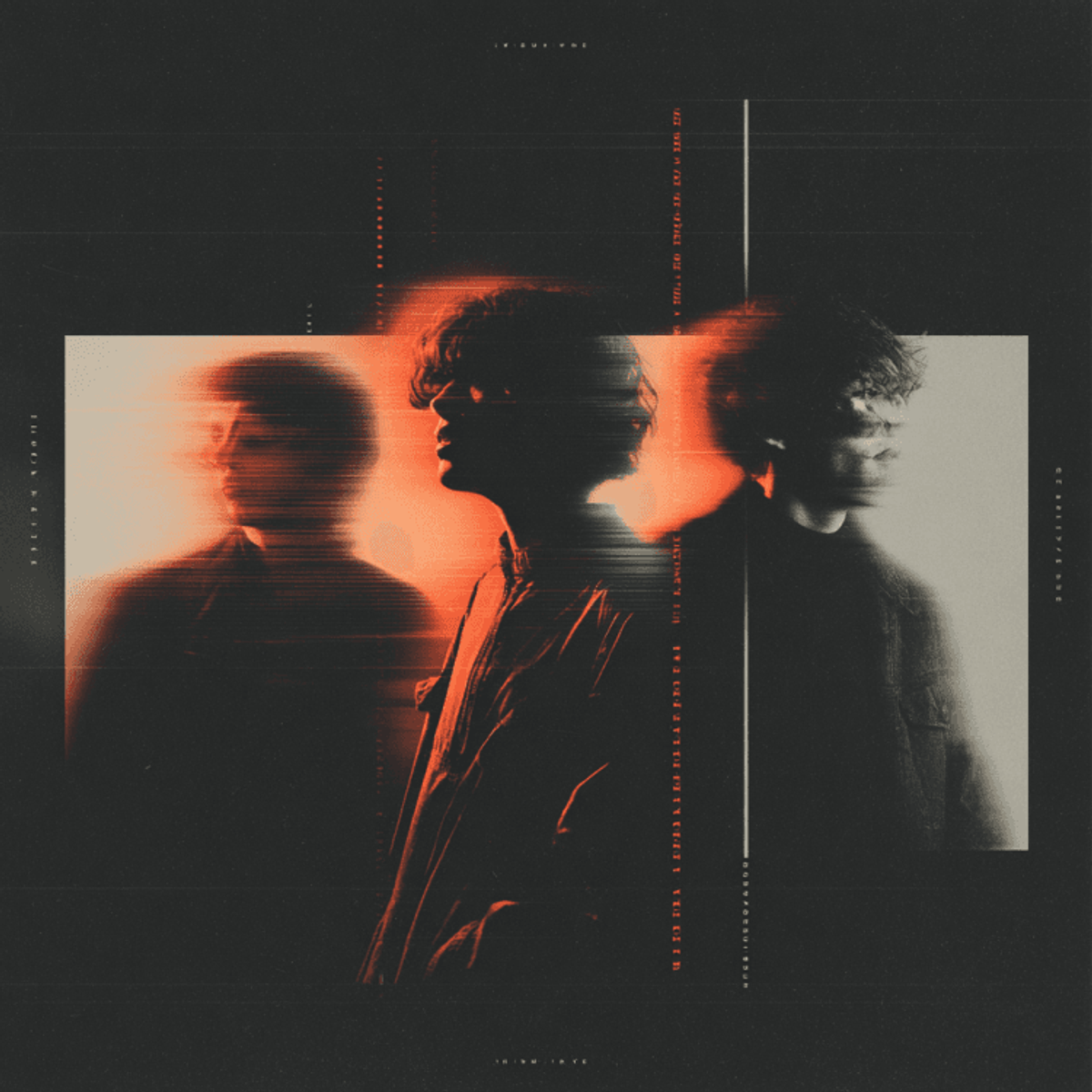 Blurred portrait of three people with red lighting.