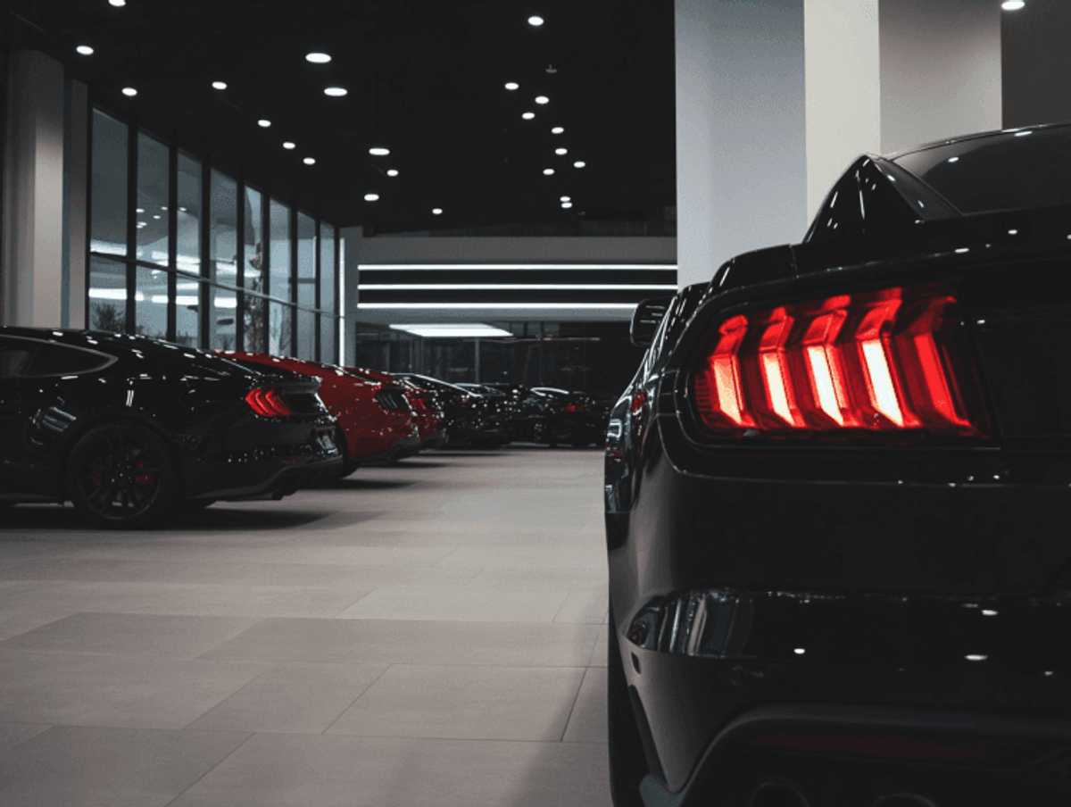 Luxury cars in a modern showroom