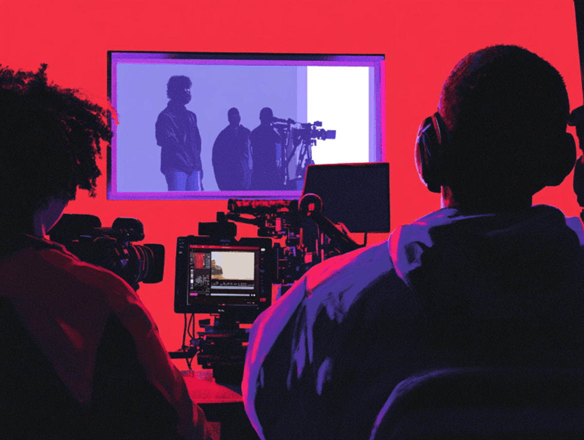 Film crew recording in brightly lit studio