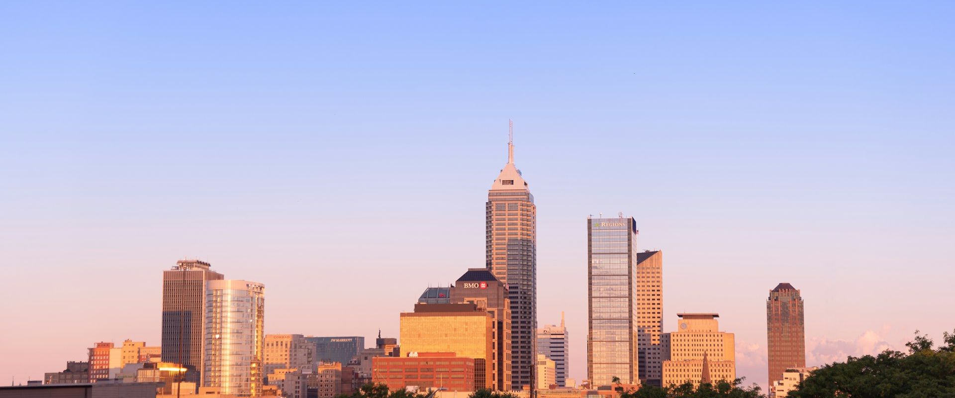 Indianapolis Indiana skyline under blue sky