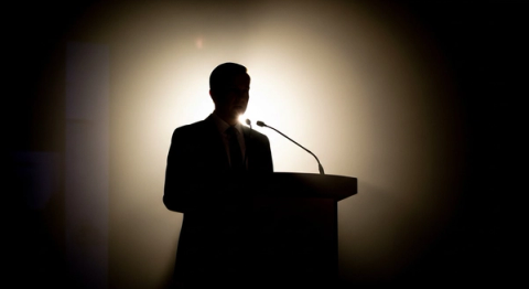 Editorial silhouette at press podium