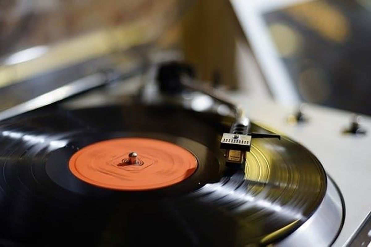 music player, record player, vinyl record, singer songwriter, professional songwriter
