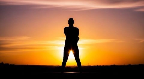 Editorial silhouette against amber sunset