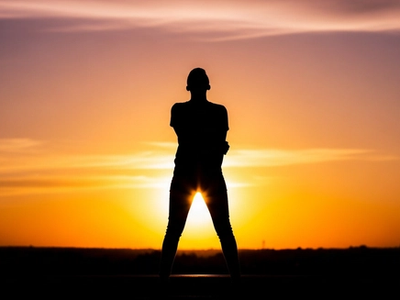 Editorial silhouette against amber sunset