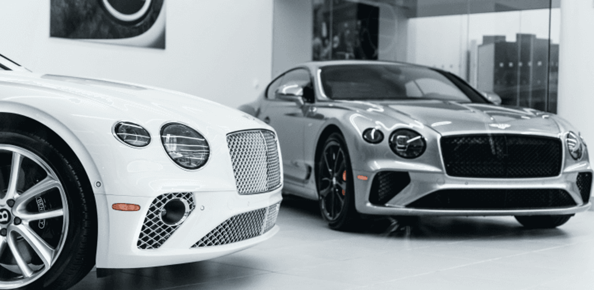 Luxury cars on showroom floor