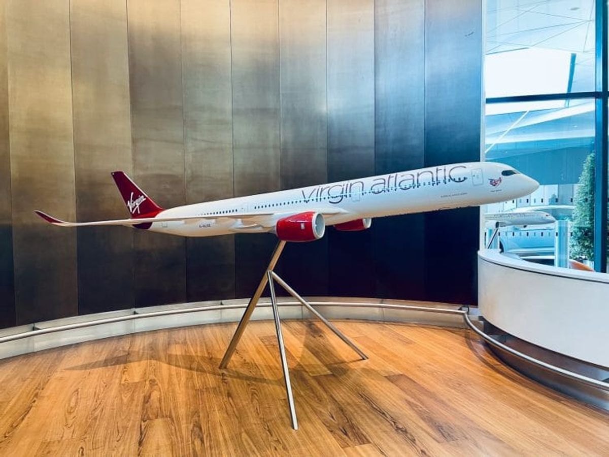 Model airplane on display in modern setting