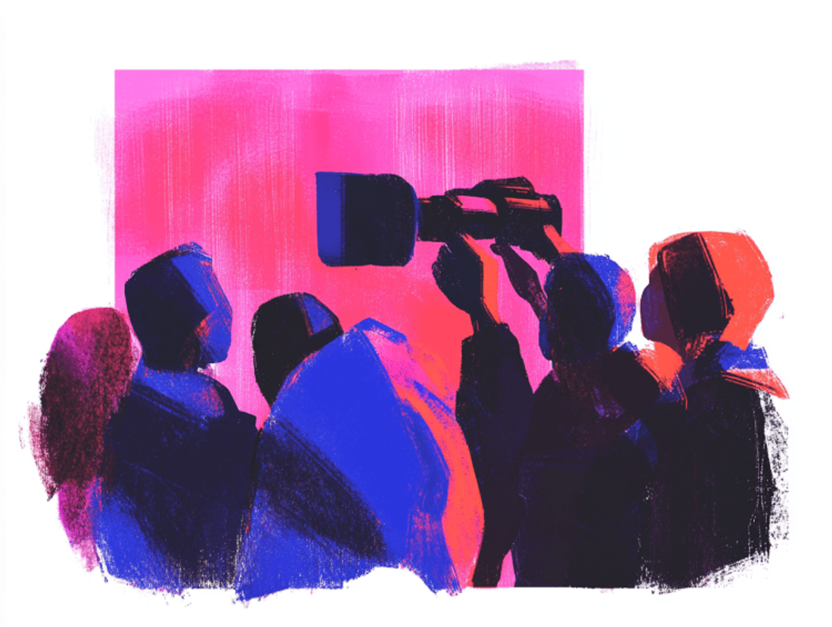 Silhouettes filming against vibrant pink background.