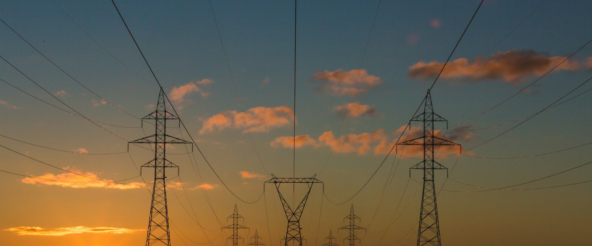 Wind turbines and solar panels in green landscape - Environmental & ESG PR