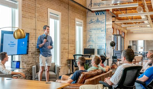 Public relations professionals strategizing in a modern conference room