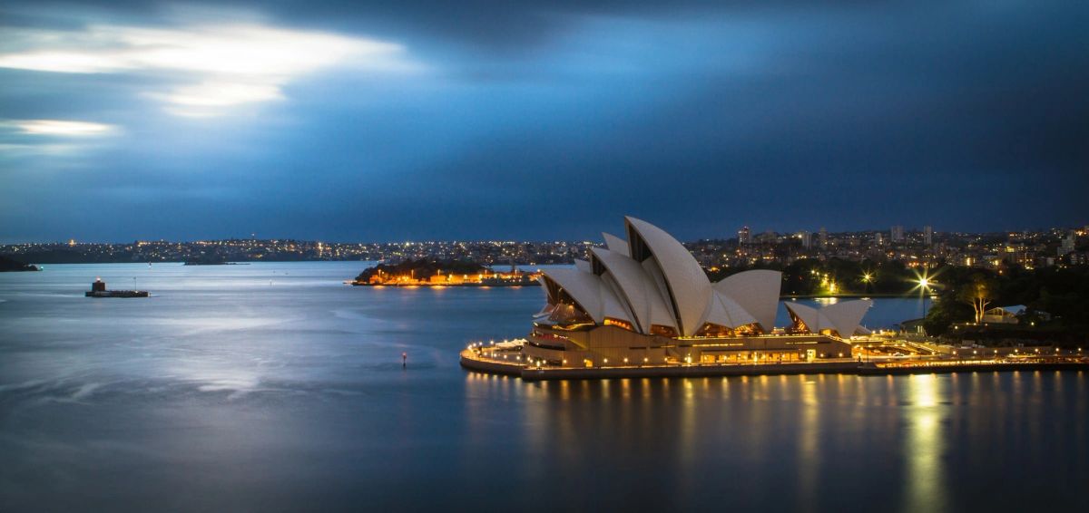 Marketing team discussing how opera house branding transforms historic venues into modern cultural powerhouses