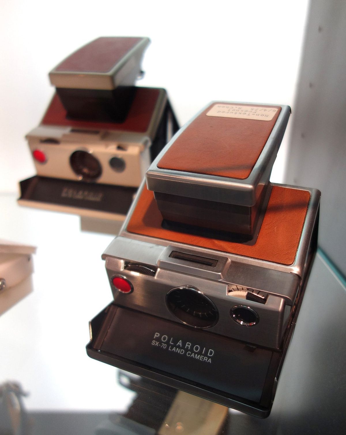Vintage Polaroid SX-70 Land Cameras on display at the MIT Museum.