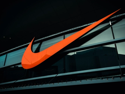 Marketing team discussing nike branding beyond the swoosh and slogans