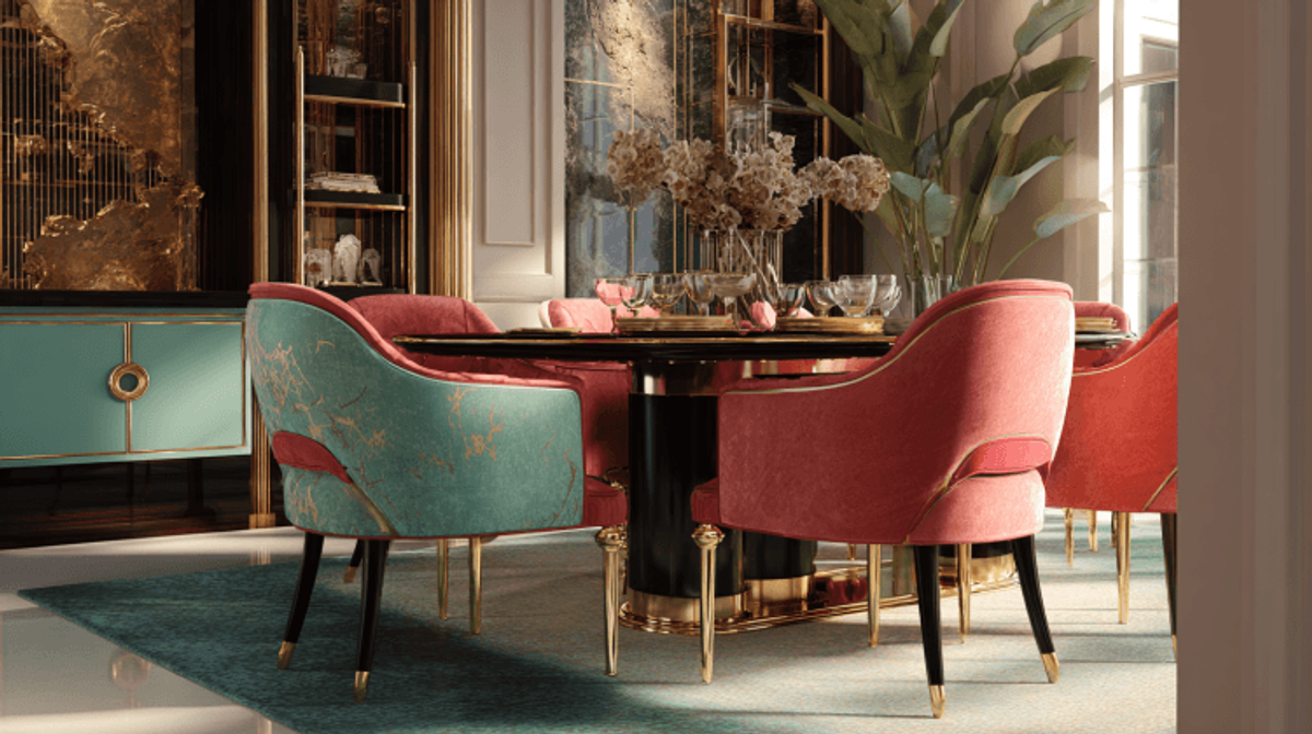 Luxurious dining room with vibrant chairs and plants.