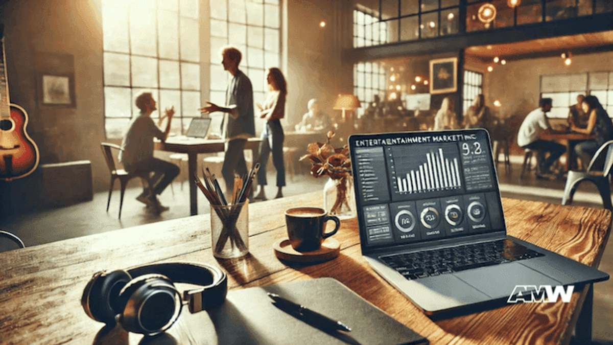 People working in a modern cafe with laptops.
