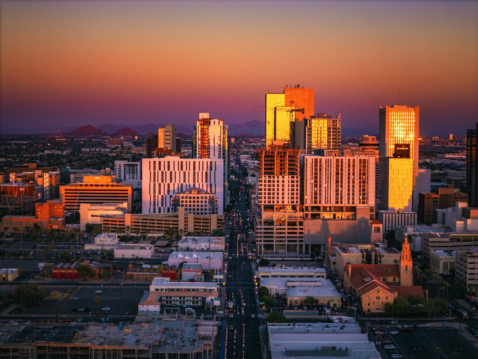 Phoenix Arizona downtown skyline with tall buildings at sunset