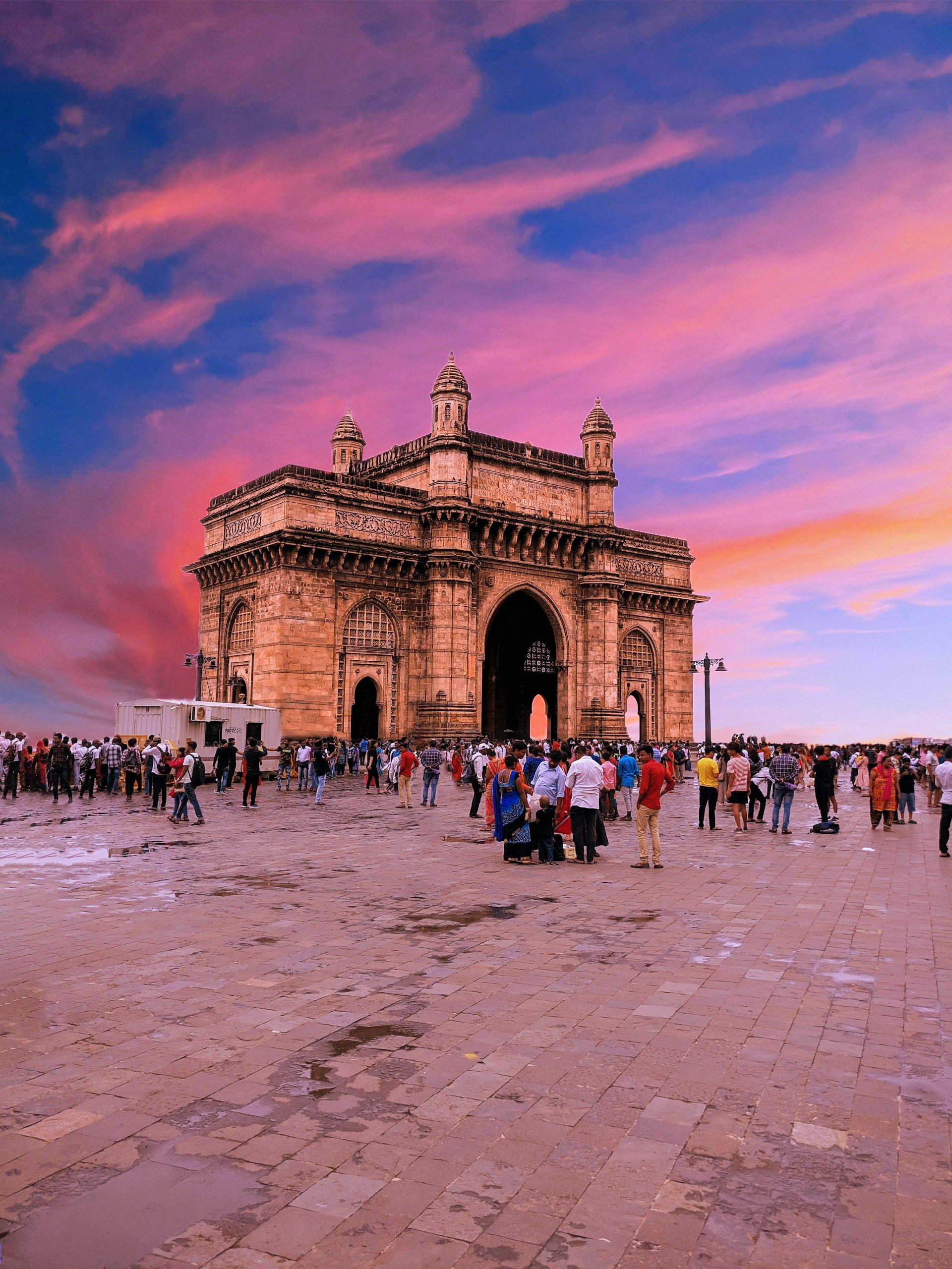 Mumbai India skyline with Gateway of India at sunset