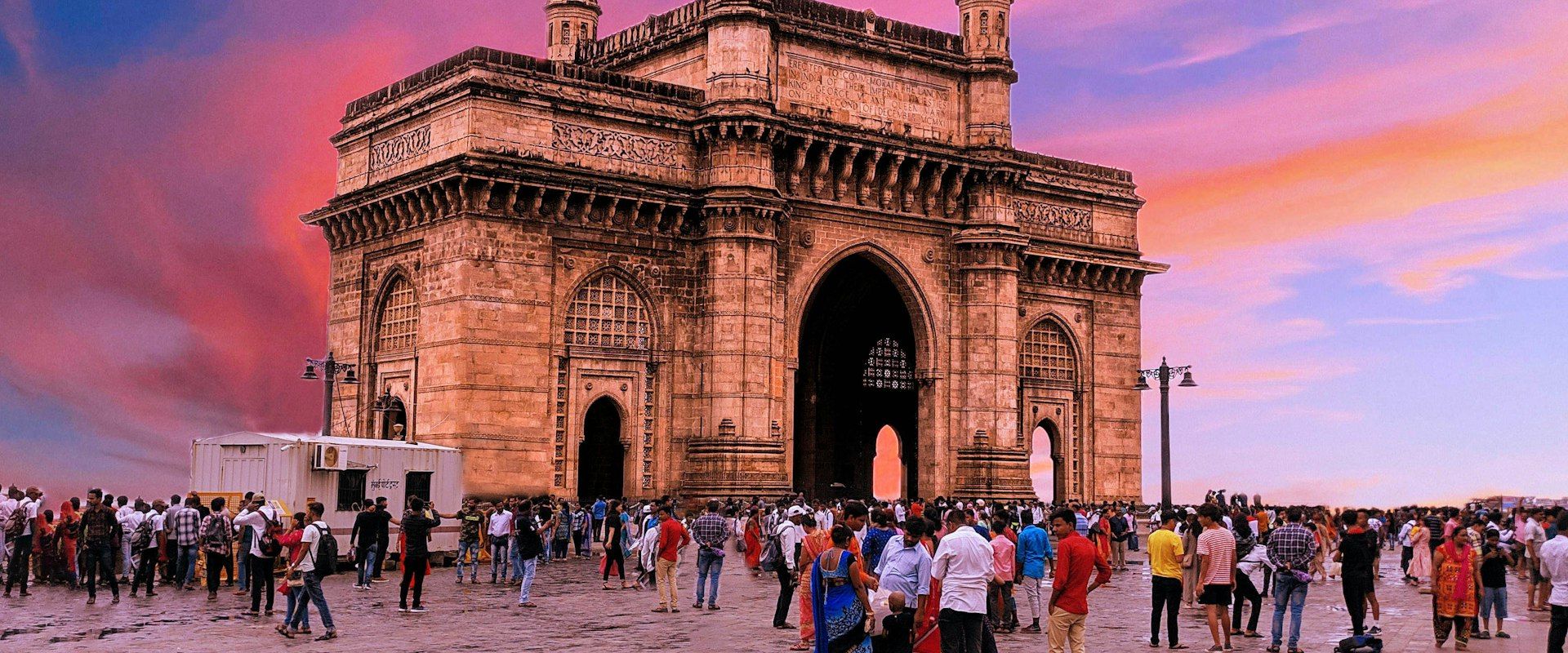 Mumbai India skyline with Gateway of India at sunset