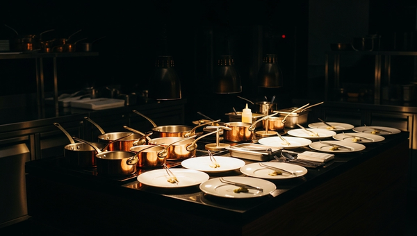 Upscale culinary event setup with elegant chef station