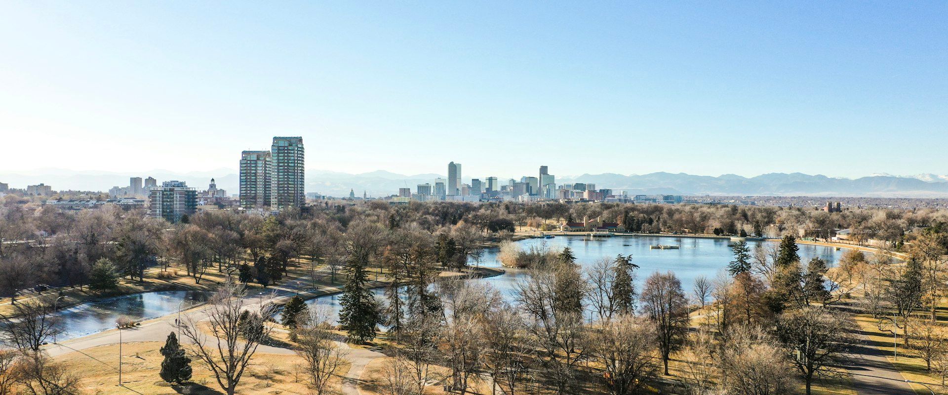 Denver Colorado skyline with Rocky Mountains - Public Relations in Denver