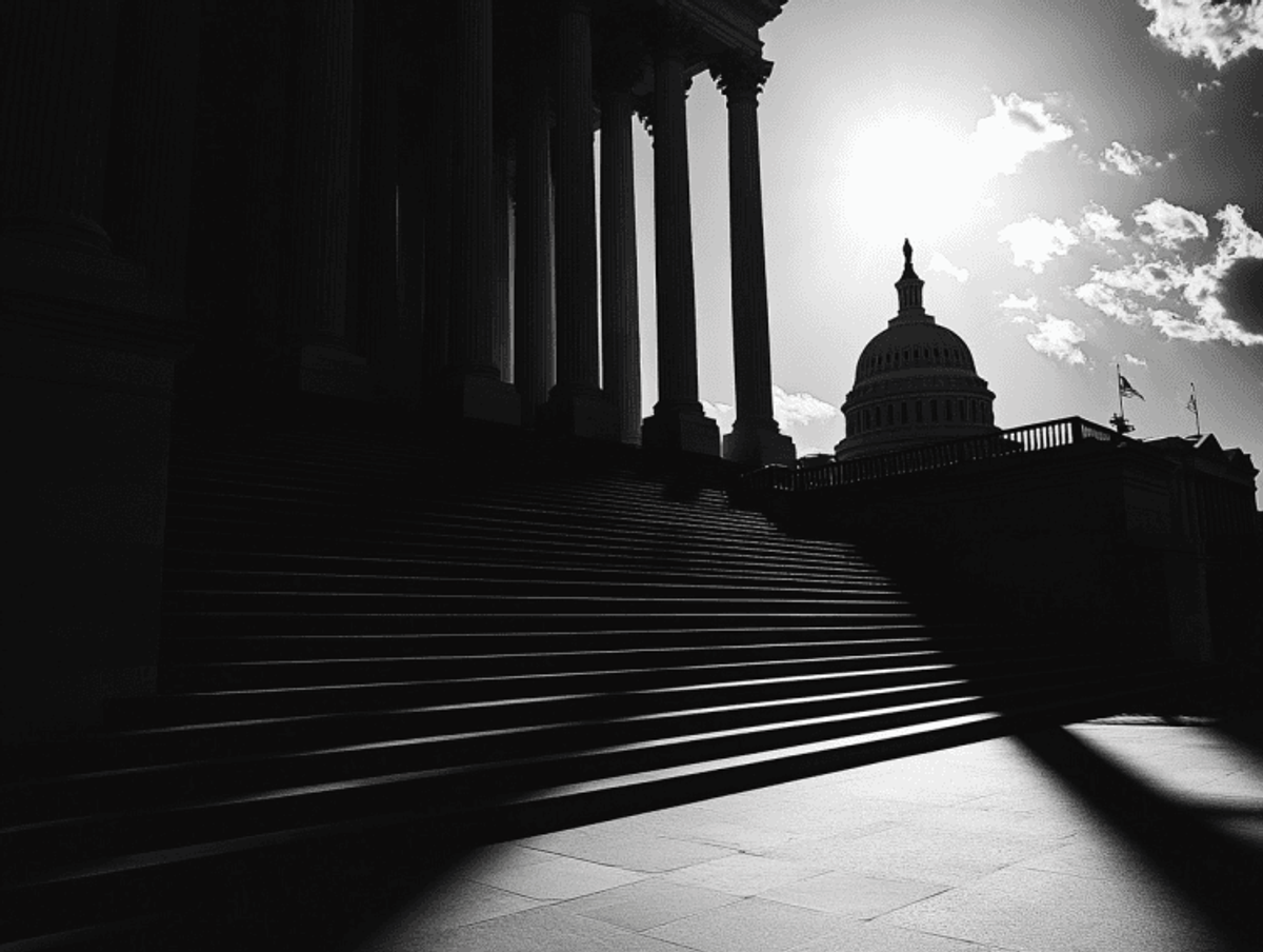 Silhouetted Capitol building and steps at sunset.