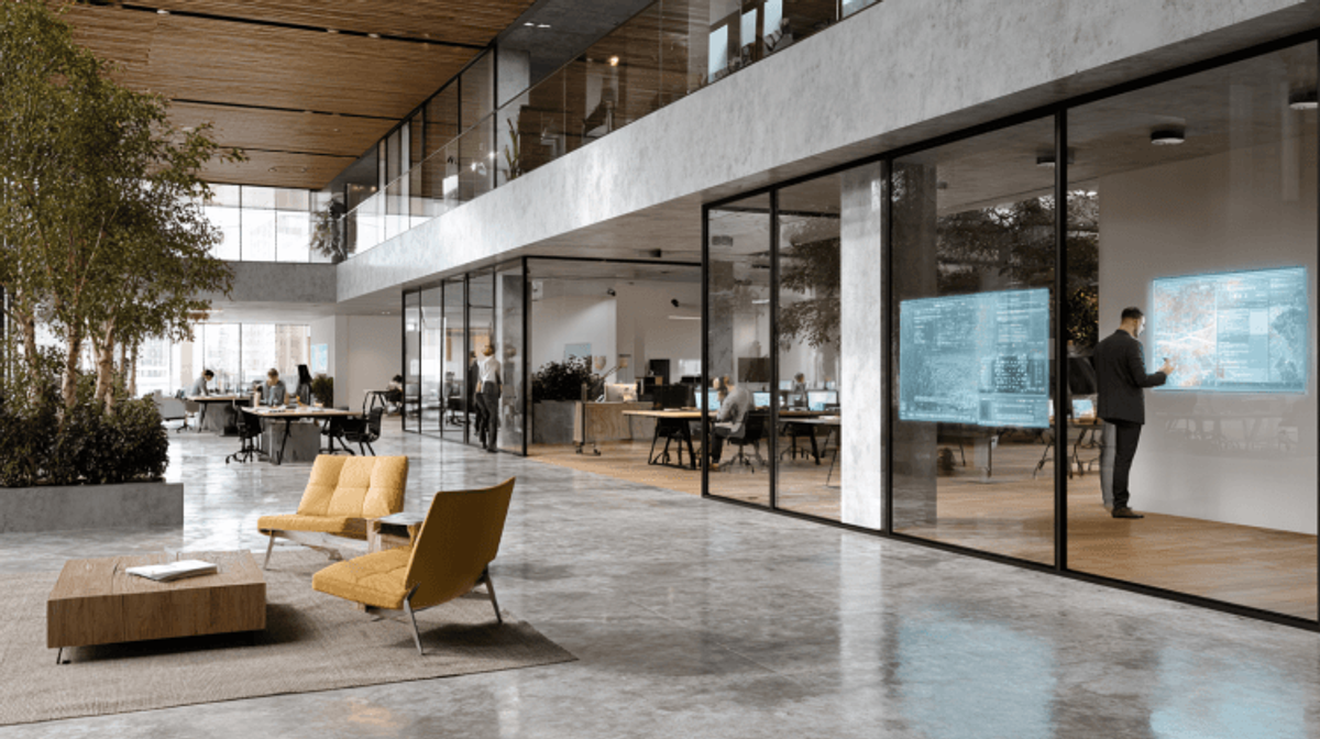 Modern open-concept office with transparent glass walls.