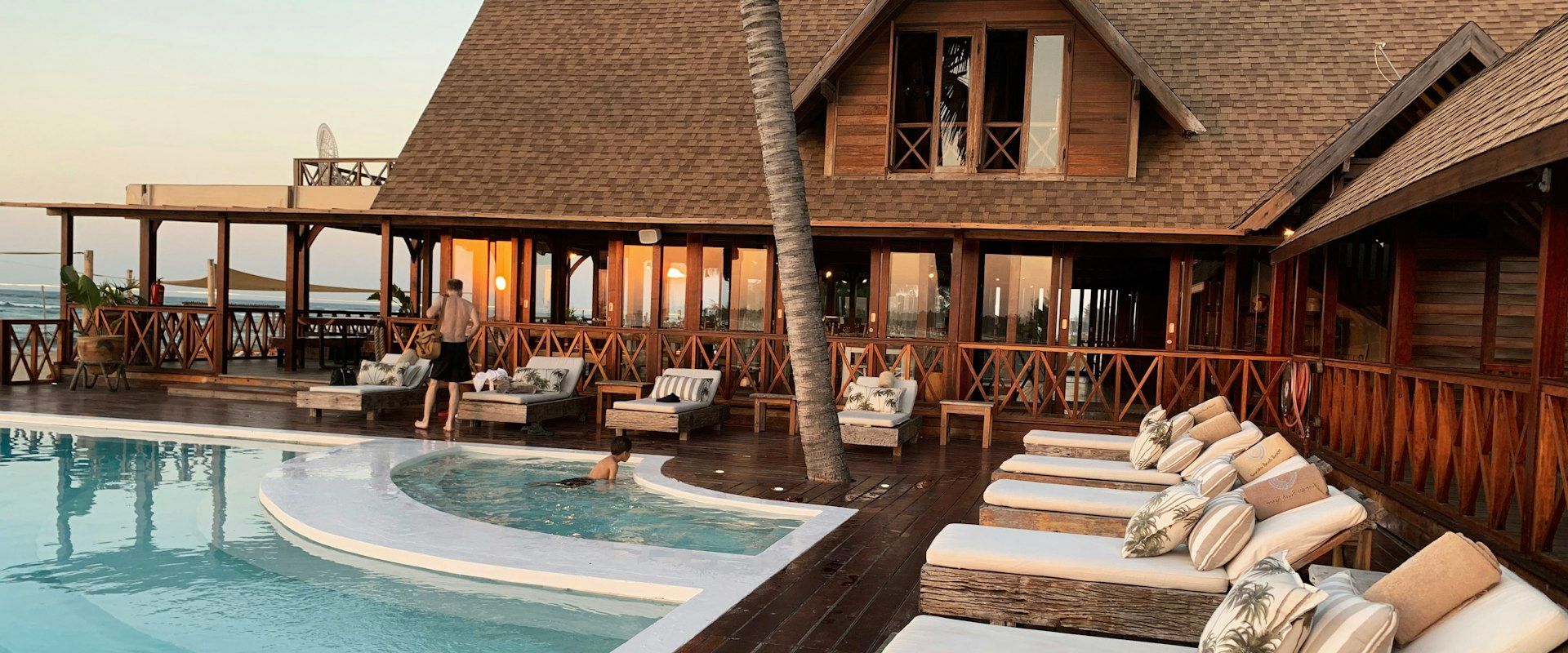 Luxury hotel pool with resort amenities - Hospitality Content Marketing